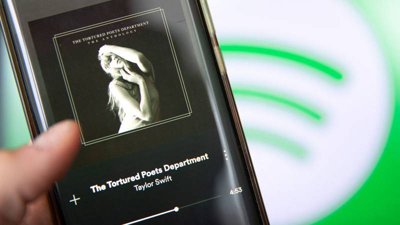 Smartphone showing Taylor Swift music