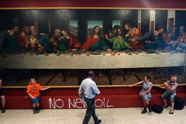 Climate activists glue themselves to paintings including copy of ‘The Last Supper’