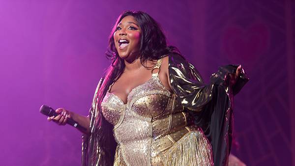 Lizzo loves being "outrageous" on TikTok: "I'm a walking birthday cake!"