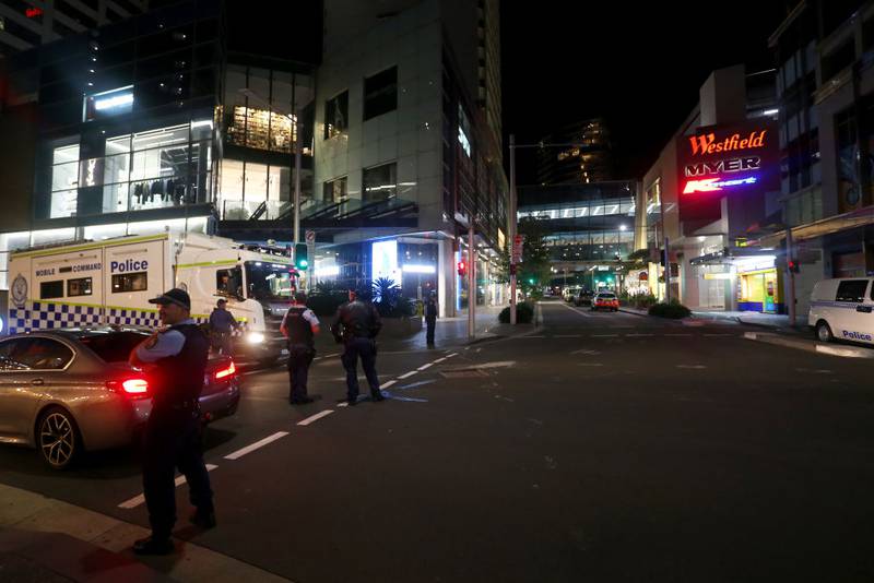 BONDI JUNCTION, AUSTRALIA - APRIL 13: NSW police vehicles arrive at Westfield Bondi Junction on April 13, 2024 in Bondi Junction, Australia. Six victims, plus the offender, are confirmed dead following an incident at Westfield Shopping Centre in Bondi Junction, Sydney. (Photo by Lisa Maree Williams/Getty Images)