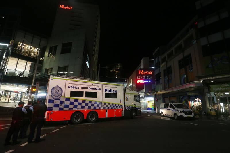 BONDI JUNCTION, AUSTRALIA - APRIL 13: NSW police vehicles arrive at Westfield Bondi Junction on April 13, 2024 in Bondi Junction, Australia. Six victims, plus the offender, are confirmed dead following an incident at Westfield Shopping Centre in Bondi Junction, Sydney. (Photo by Lisa Maree Williams/Getty Images)