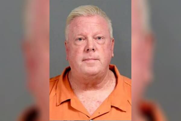 Ex-Michigan teacher, dean faces sex charge, may have targeted 15 boys and men, sheriff says