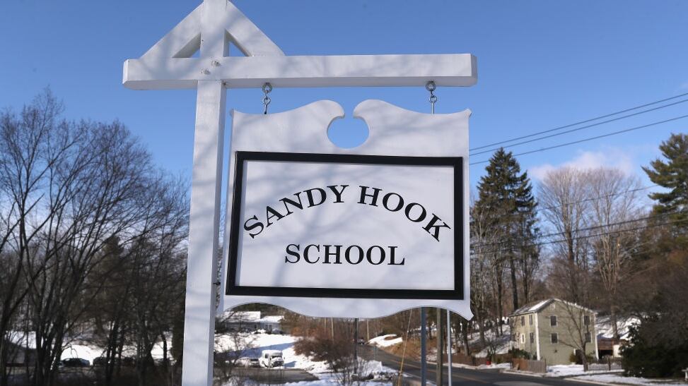 SANDY HOOK, CT - MARCH 14: A sign stands near the site of the December 2012 Sandy Hook school shooting on the day of the National School Walkout on March 14, 2018 in Sandy Hook Connecticut. Several hundred students at the school, near the site of the Sandy Hook school massacre of December 14, 2012, staged a protest one month after 17 people were killed at Stoneman Douglas High School in Parkland, Florida. Media and visitors were not allowed on the Newtown High campus for the event. (Photo by John Moore/Getty Images)